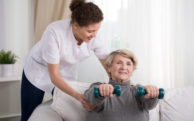 Old,Woman,Training,With,Physiotherapist,At,Home